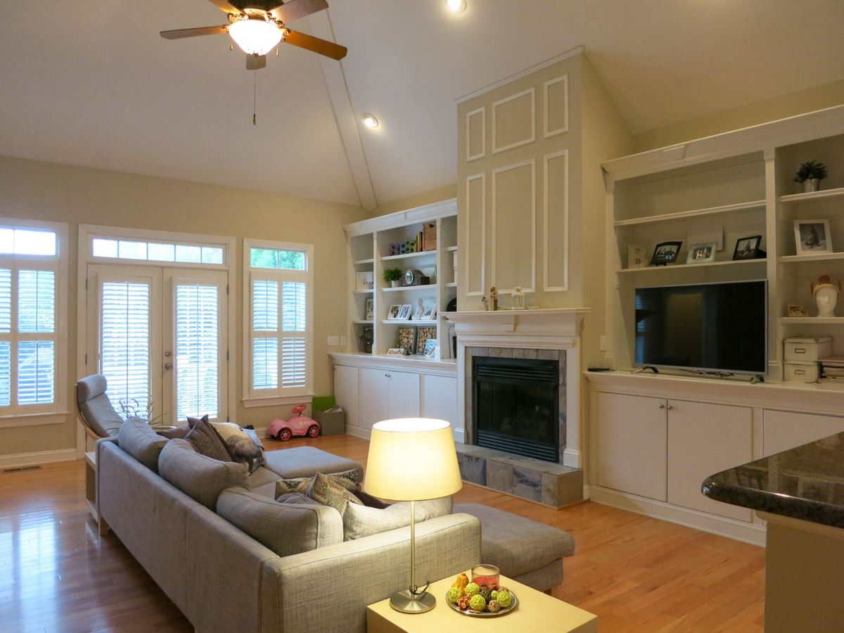BIG vaulted Living Rm w/built-in cabinetry, hardwood flr, CF & gorgeous FP. Living Room