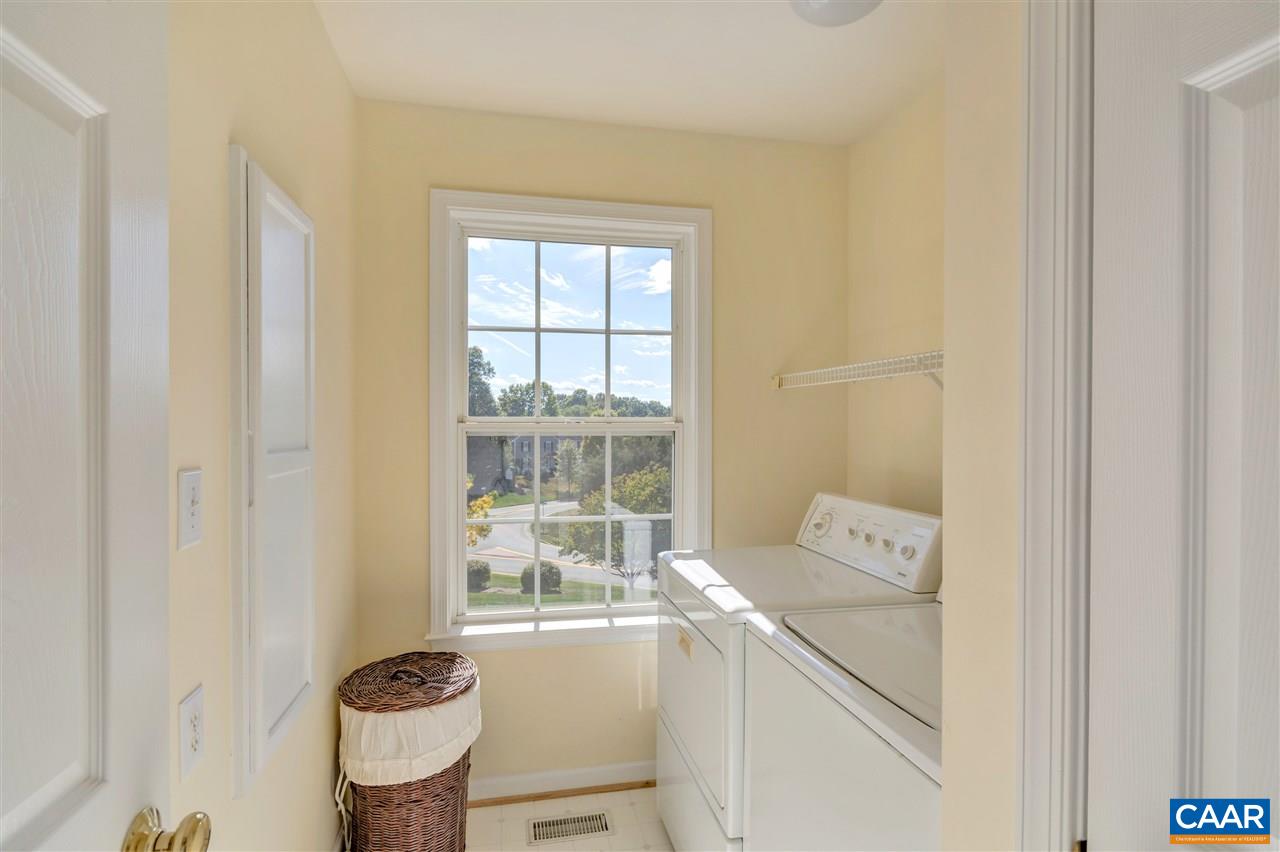 3077 Chimney Ridge Charlottesville, VA 22911 - Photo 15 of 21 Laundry room is conveniently located near bedrooms and has built-in ironing board and linen closet.