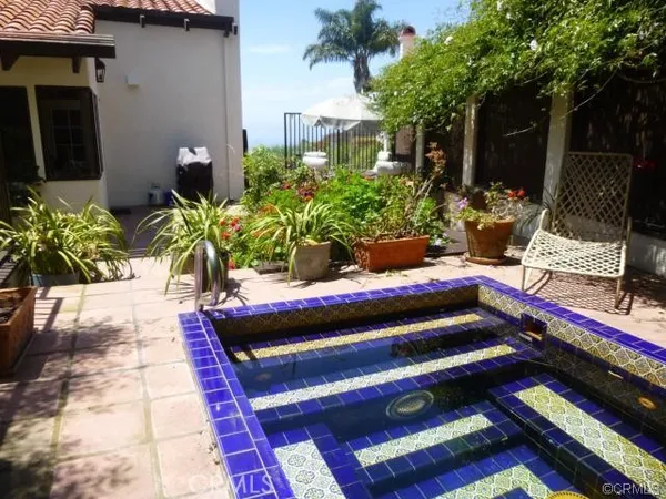 a bathroom with a tub and sink
