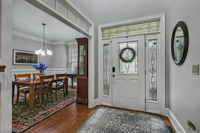 a view of living room filled with furniture and window