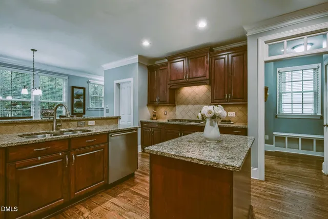 a kitchen with a stove and a sink