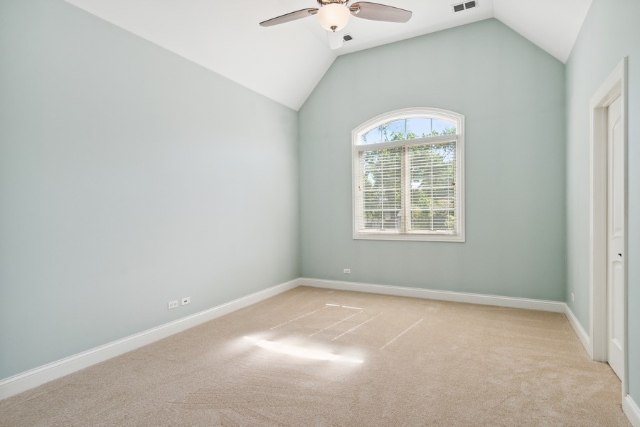 4050 Douglas Road Downers Grove, IL 60515 - Photo 29 of 60 an empty room with a window