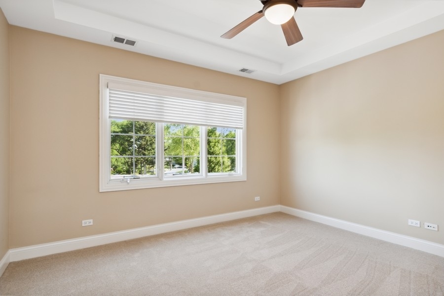 4050 Douglas Road Downers Grove, IL 60515 - Photo 31 of 60 an empty room with a window