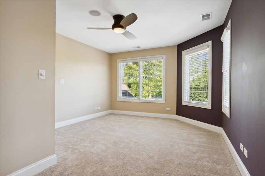 4050 Douglas Road Downers Grove, IL 60515 - Photo 33 of 60 a view of an empty room with a window