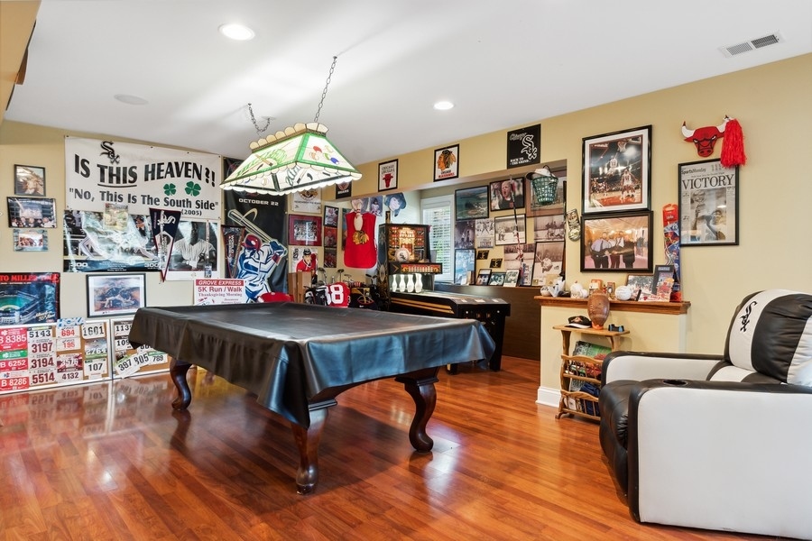 4050 Douglas Road Downers Grove, IL 60515 - Photo 40 of 60 a living room with furniture pool table and window