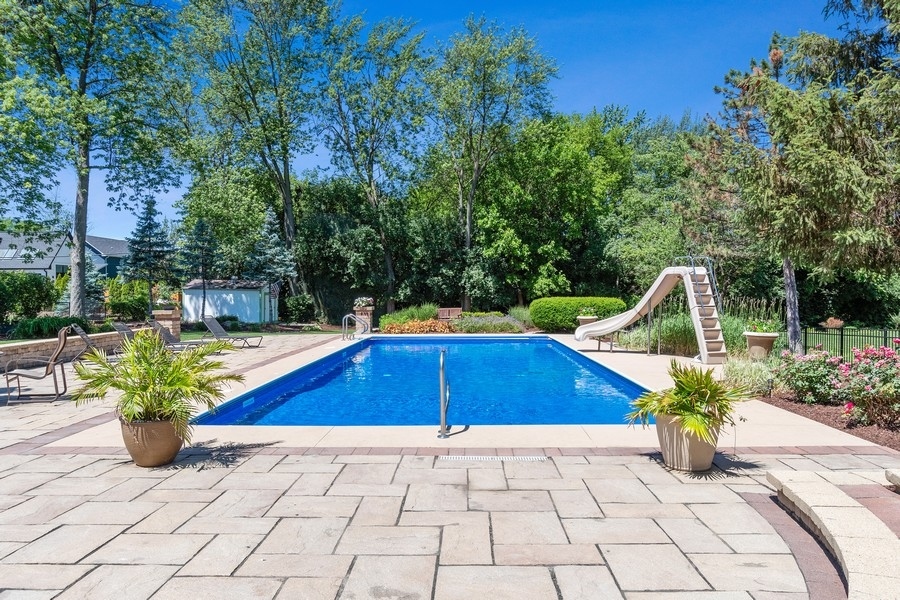 4050 Douglas Road Downers Grove, IL 60515 - Photo 52 of 60 a view of a backyard with sitting area