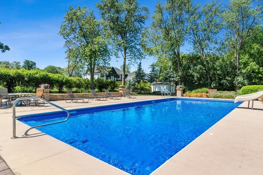 4050 Douglas Road Downers Grove, IL 60515 - Photo 53 of 60 a view of swimming pool with chairs