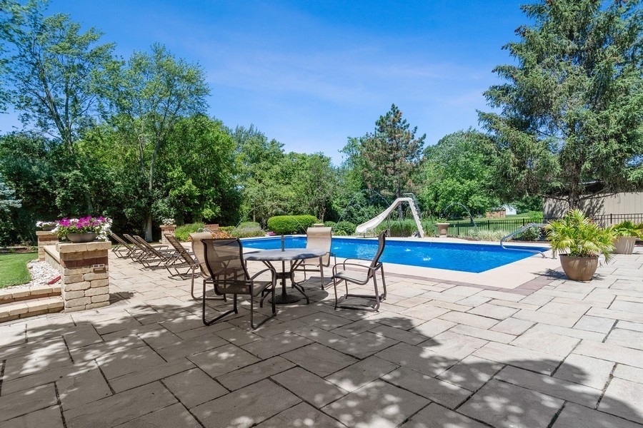 4050 Douglas Road Downers Grove, IL 60515 - Photo 55 of 60 a view of playground with furniture and a yard