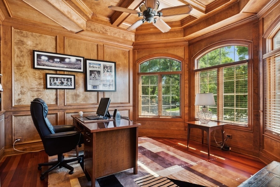 4050 Douglas Road Downers Grove, IL 60515 - Photo 8 of 60 a living room with furniture and large windows