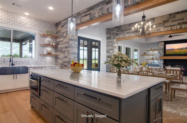 a kitchen with counter space cabinets and wooden floor
