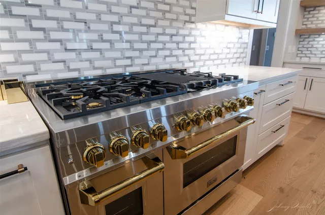 a close view of a stove a microwave and a stove