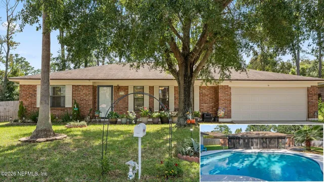 a view of a yard in front of a house