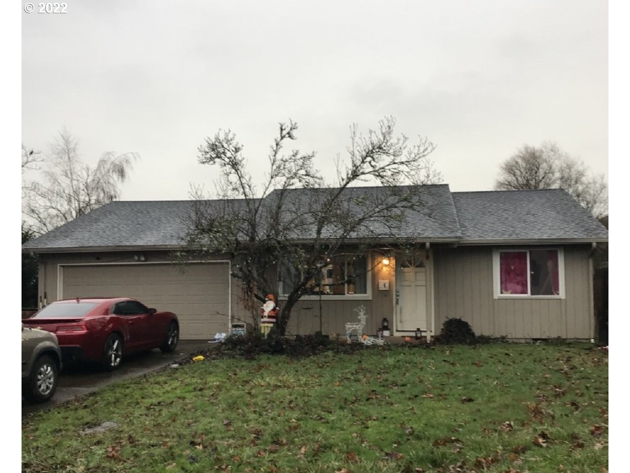 558 Janus Street Springfield, OR 97477 - Photo 1 of 10 a view of a house with a garden