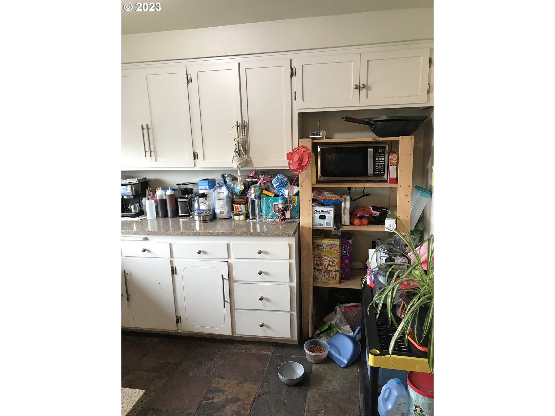 558 Janus Street Springfield, OR 97477 - Photo 8 of 10 a room with storage and utility