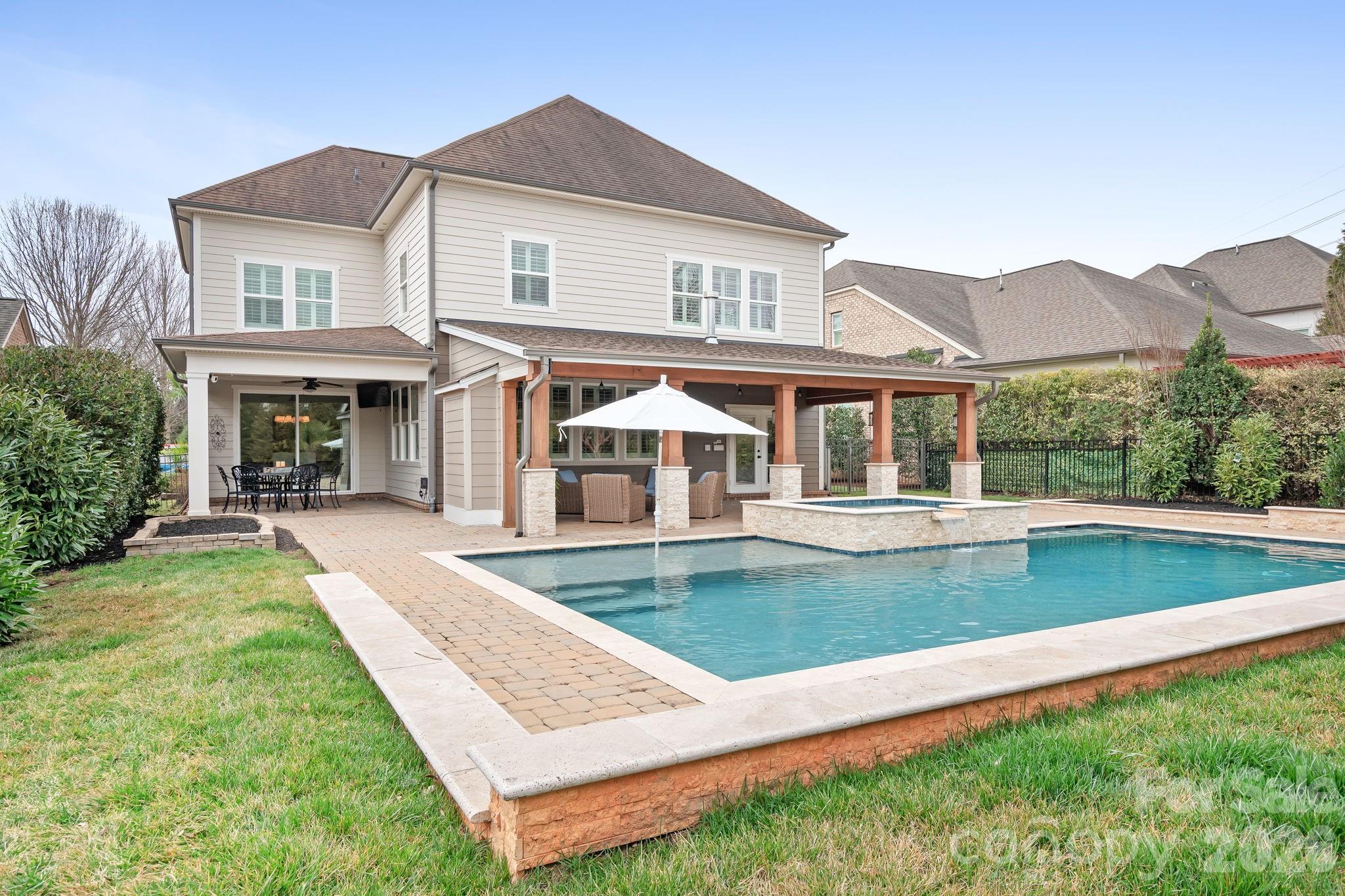 9121 Robbins Preserve Road Cornelius, NC 28031 - Photo 17 of 47 front view of a house with a yard