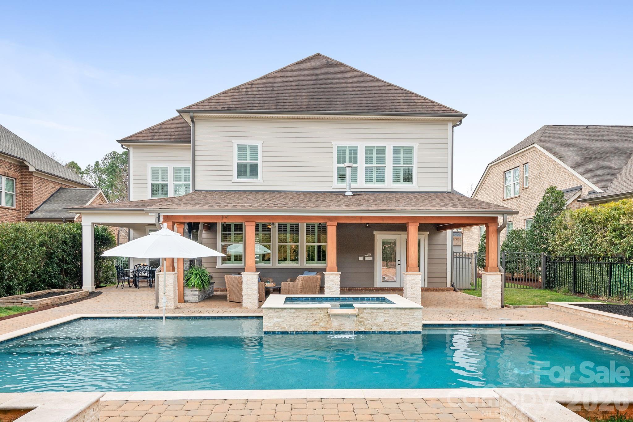 9121 Robbins Preserve Road Cornelius, NC 28031 - Photo 2 of 47 a view of a house with a yard and furniture