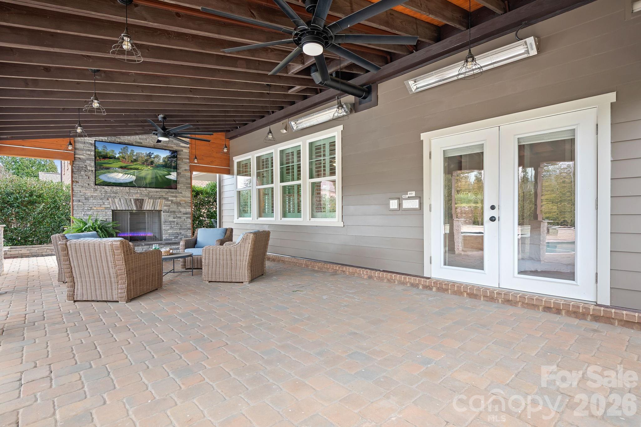 9121 Robbins Preserve Road Cornelius, NC 28031 - Photo 21 of 47 a view of a patio with couches and potted plants