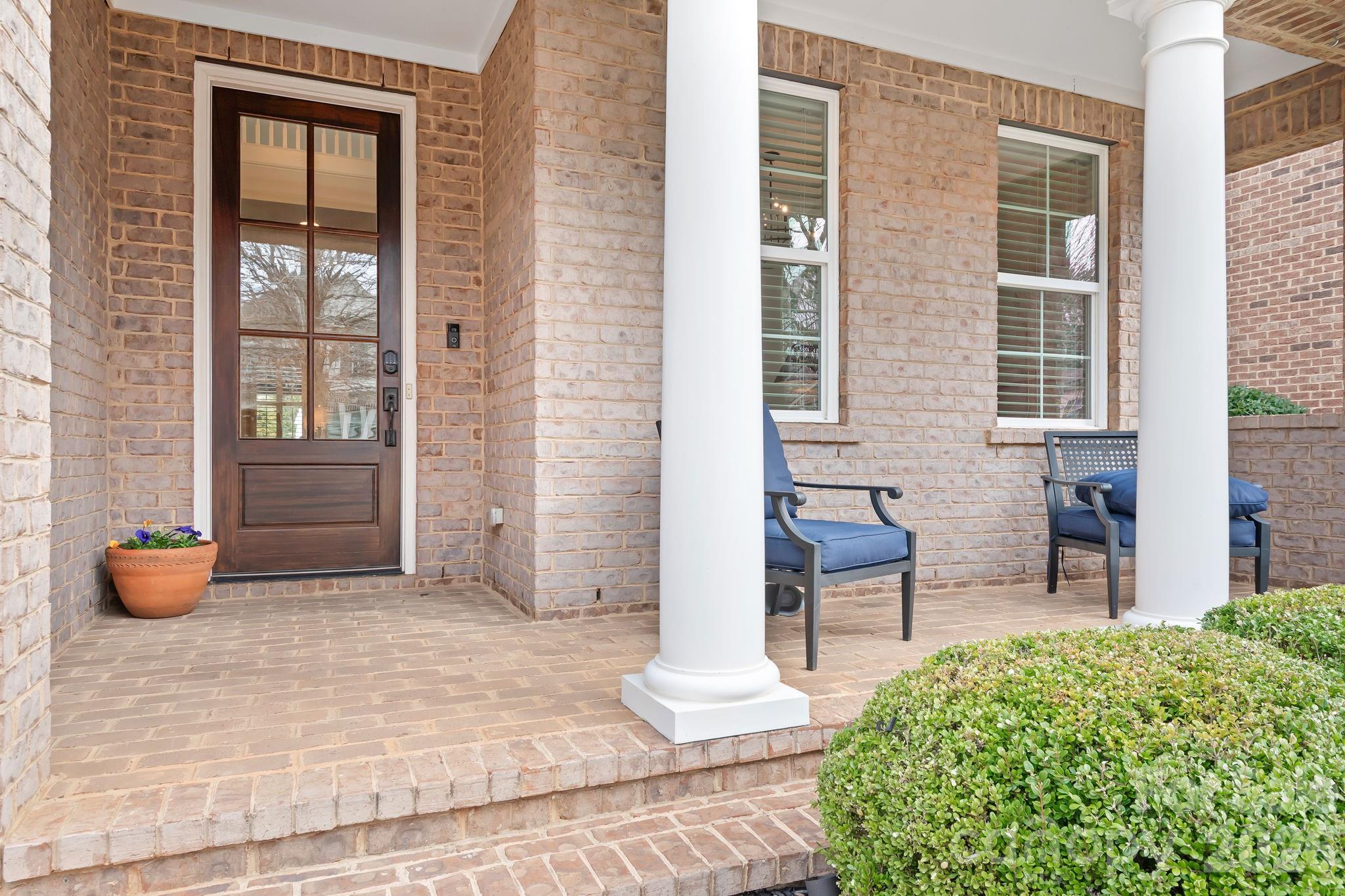 9121 Robbins Preserve Road Cornelius, NC 28031 - Photo 3 of 47 a front view of a house with outdoor seating