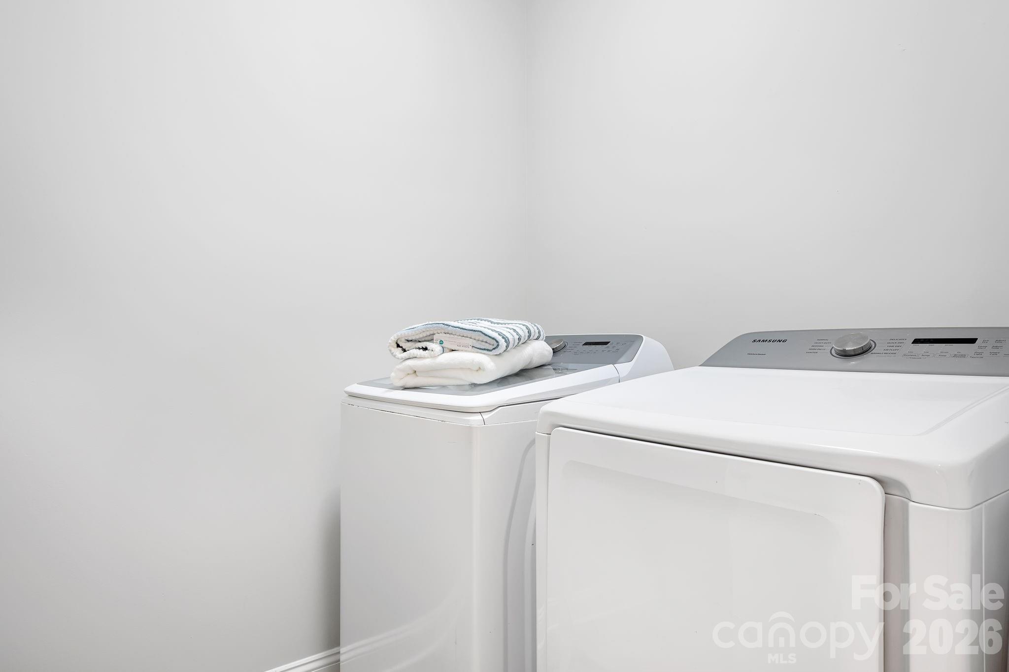 9121 Robbins Preserve Road Cornelius, NC 28031 - Photo 32 of 47 a utility room with dryer and washer