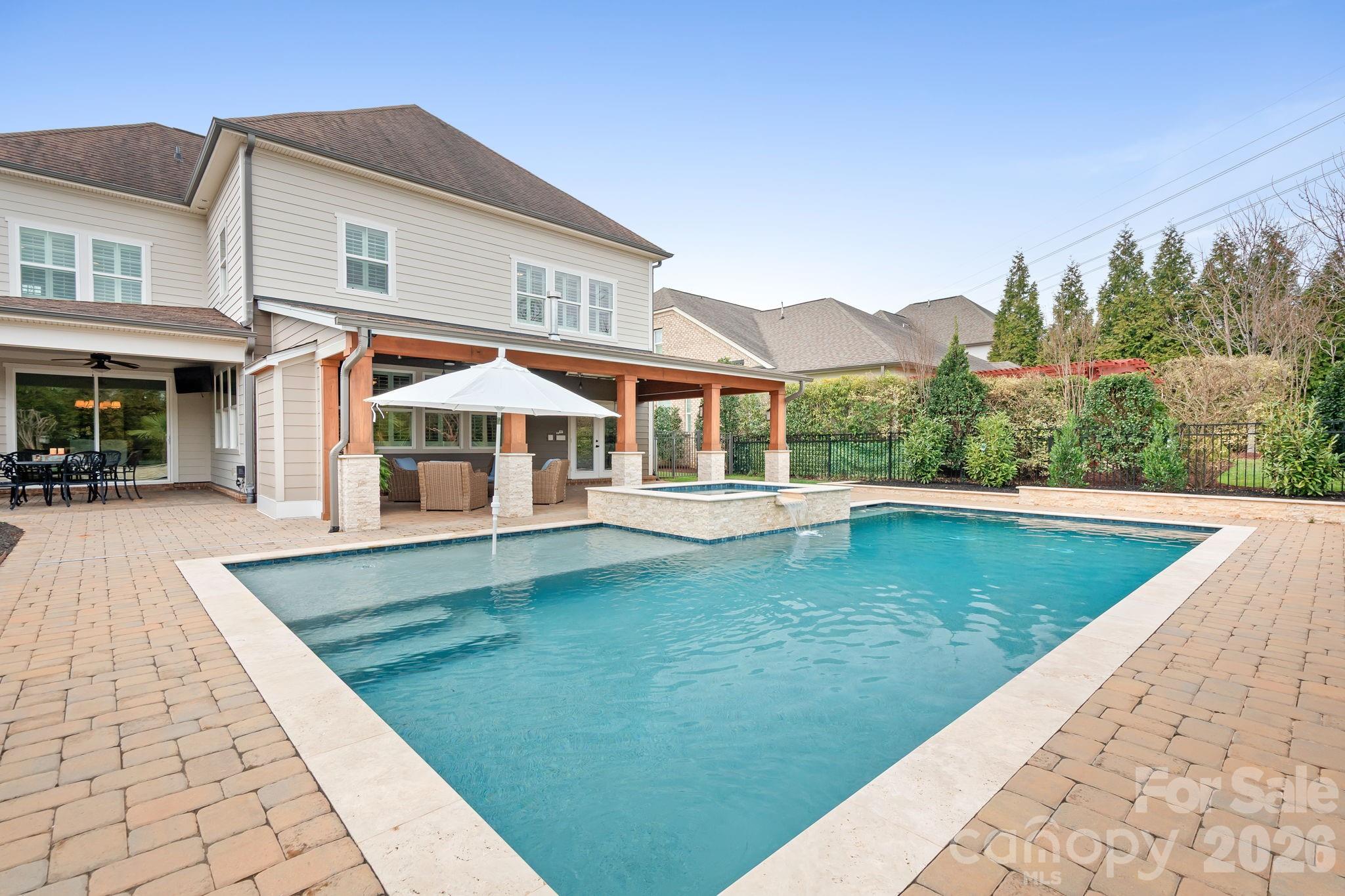 9121 Robbins Preserve Road Cornelius, NC 28031 - Photo 35 of 47 a view of a house with swimming pool