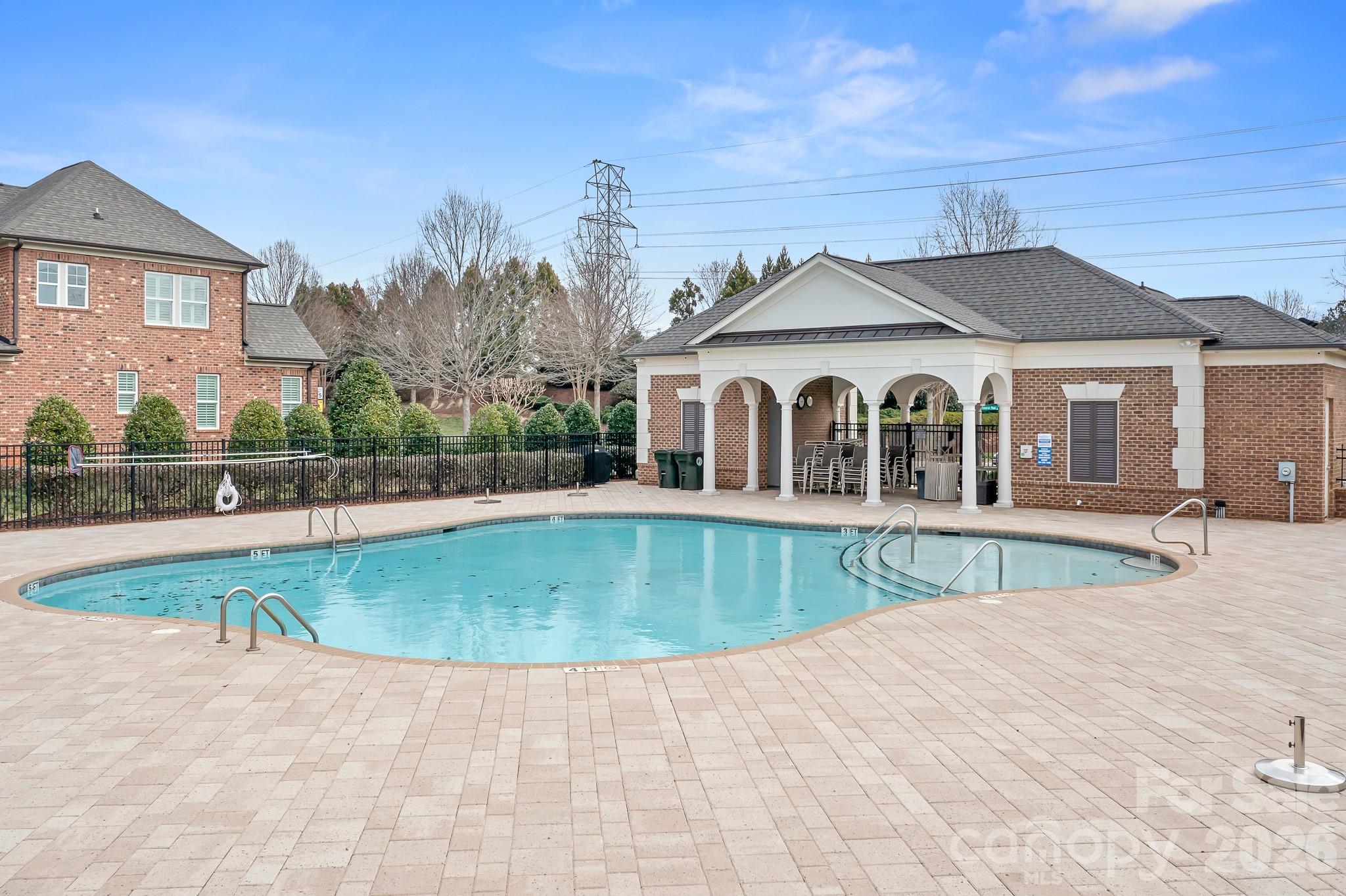 9121 Robbins Preserve Road Cornelius, NC 28031 - Photo 40 of 47 a view of a house with a swimming pool