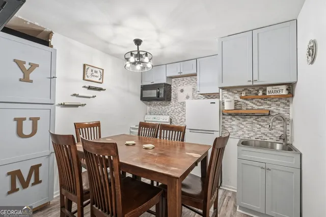 a view of a dining room with furniture