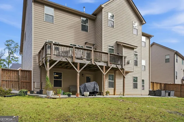 a front view of house with a yard