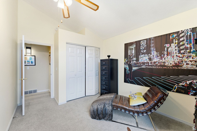 7930 Mustang Loop Road Park City, UT 84098 - Photo 14 of 23 Living area with vaulted ceiling, carpet floors, and a ceiling fan