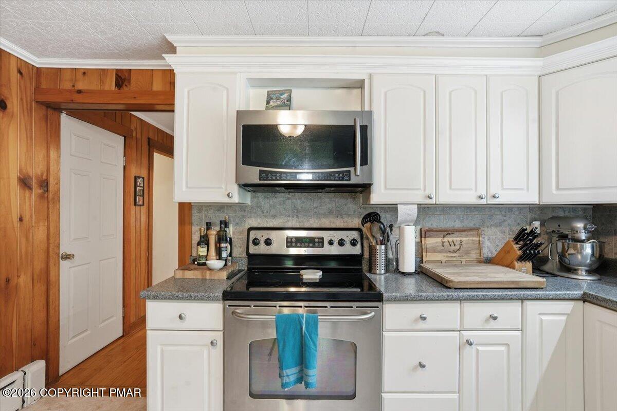 232 Garrity Road Hawley, PA 18428 - Photo 28 of 57 a kitchen with a stove and a microwave