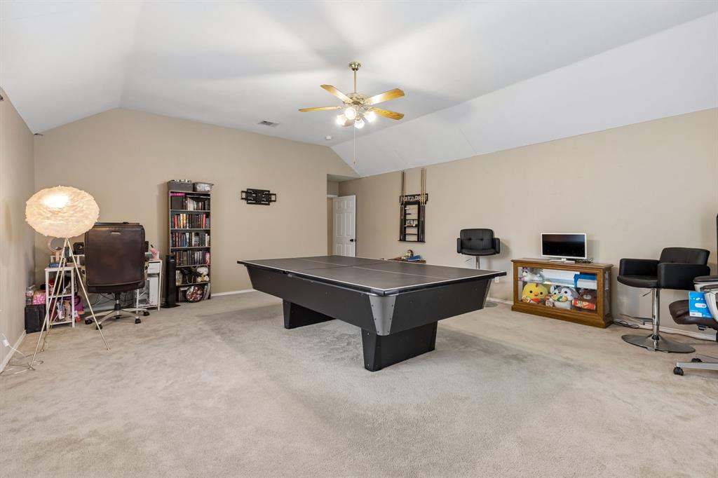 129 Timberbluff Lane Murphy, TX 75094 - Photo 25 of 34 a living room with furniture and a flat screen tv
