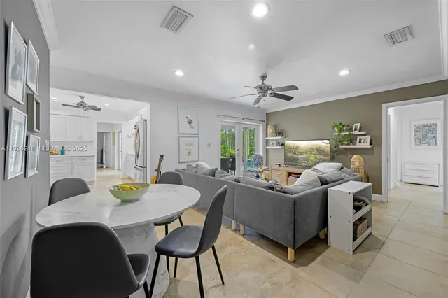 a living room with furniture and a table