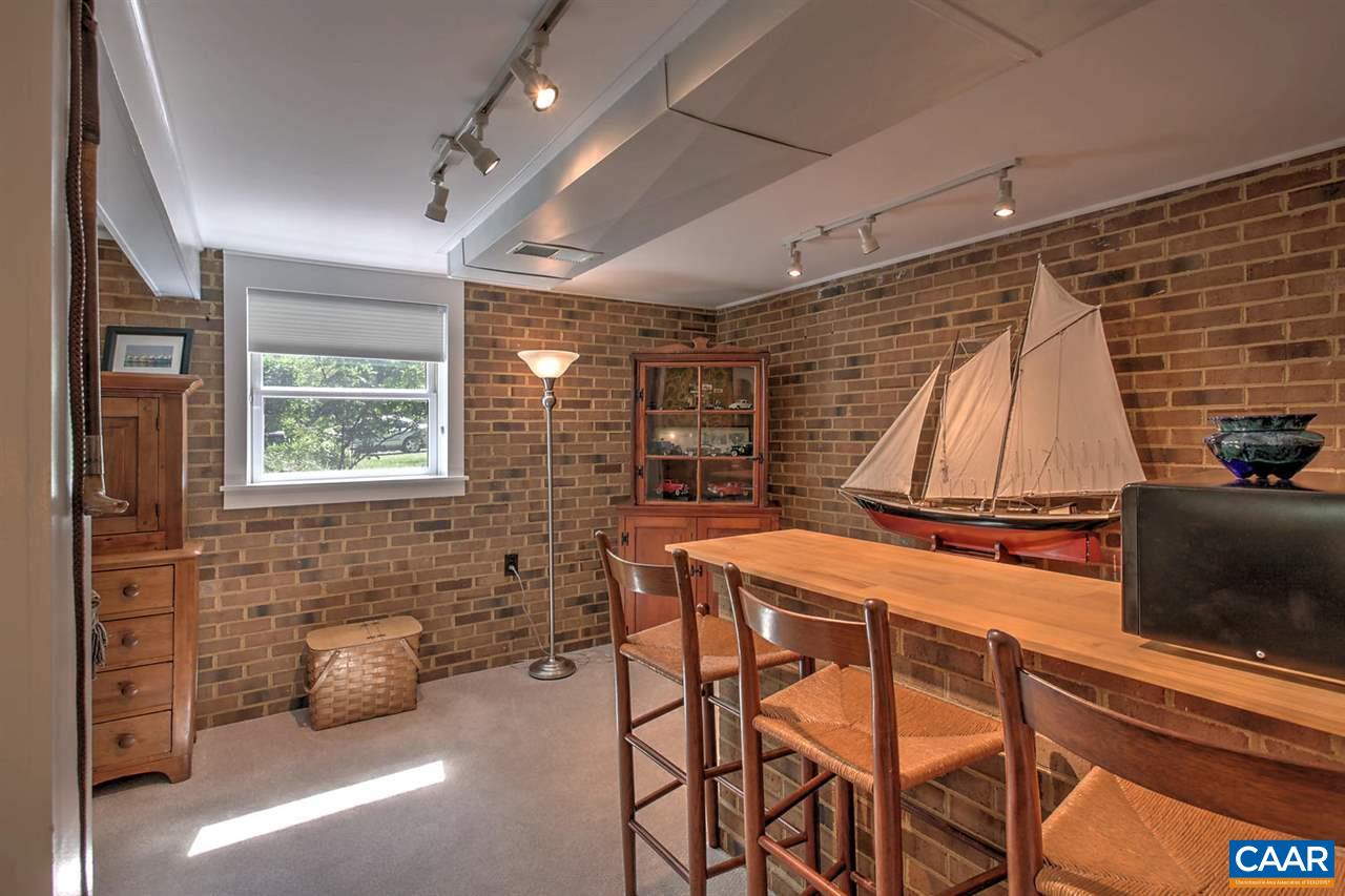 4194 Dickerson Road Charlottesville, VA 22911 - Photo 17 of 28 a dining room with furniture and a window