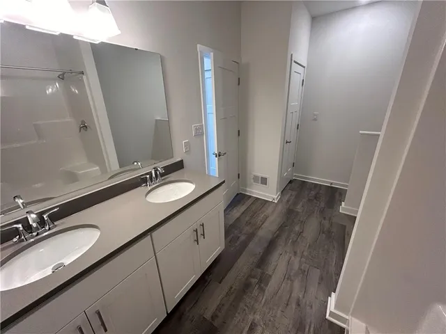 a view of a bathtub in a bathroom