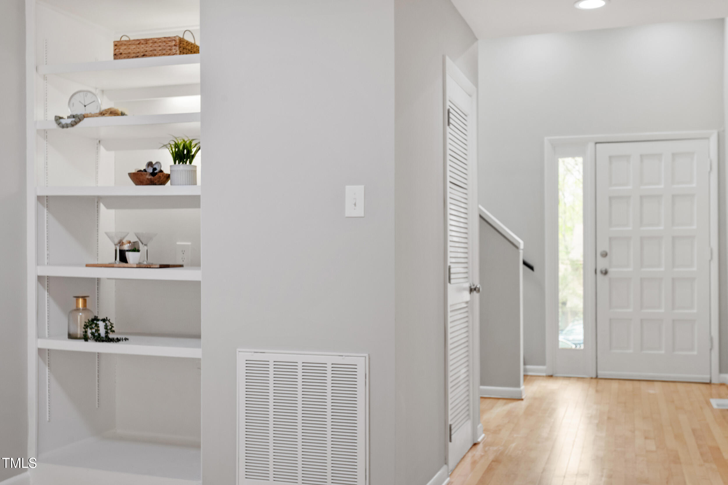 58 Stoneridge Road Durham, NC 27705 - Photo 20 of 38 a view of an entryway with wooden floor
