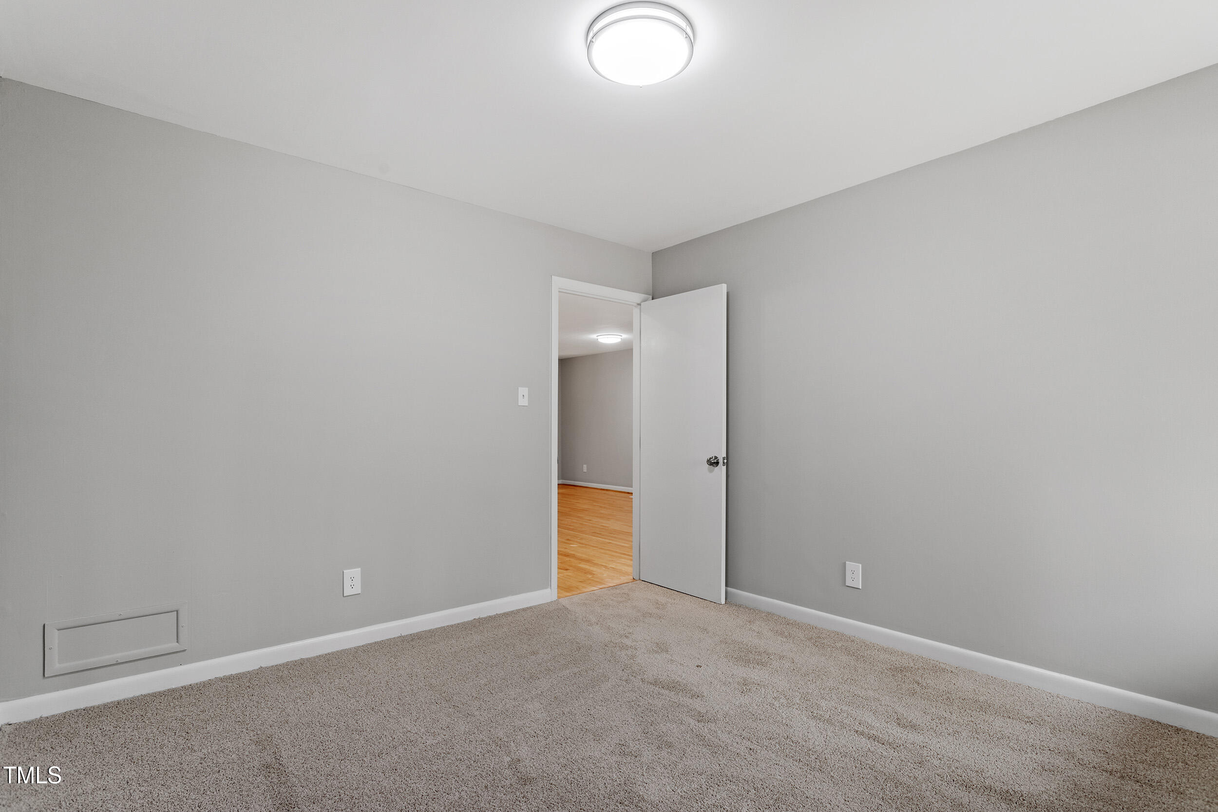 58 Stoneridge Road Durham, NC 27705 - Photo 22 of 38 a view of an empty room