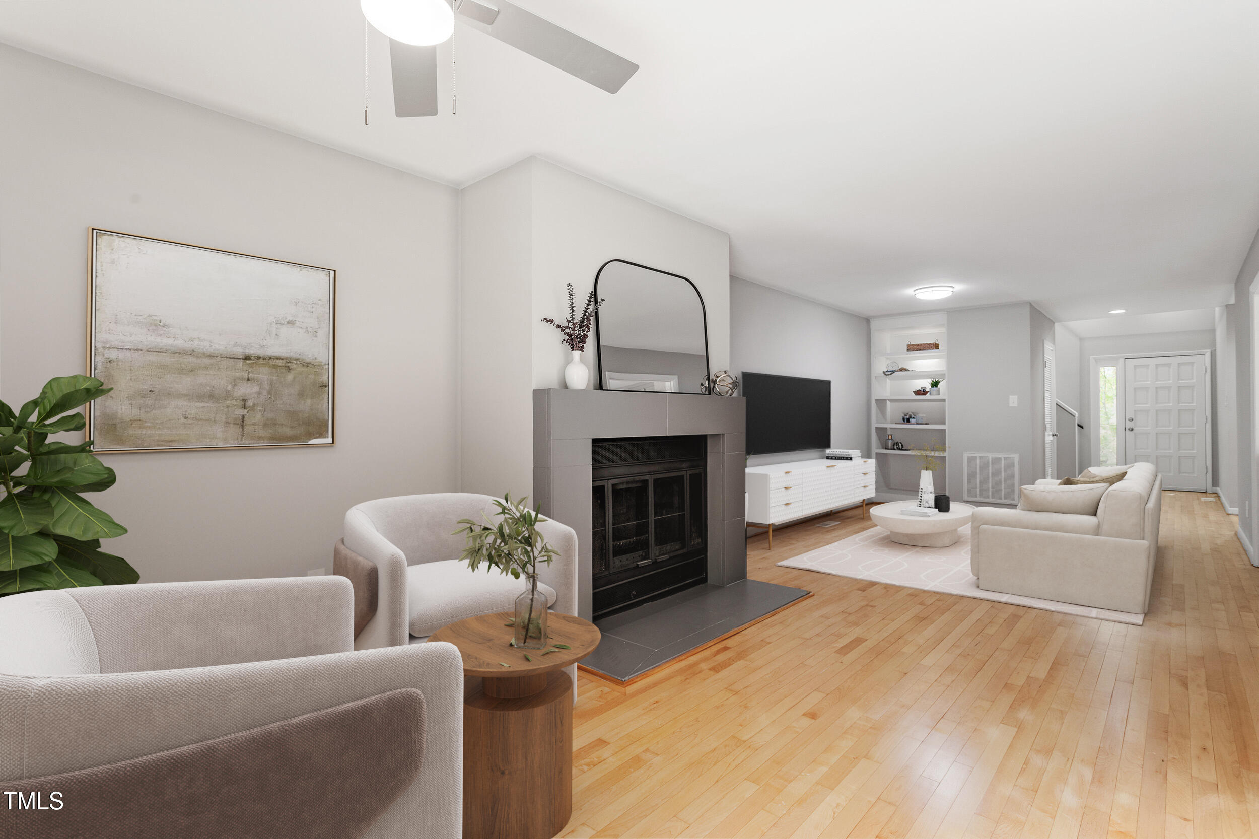58 Stoneridge Road Durham, NC 27705 - Photo 3 of 38 a living room with furniture a window and a fireplace