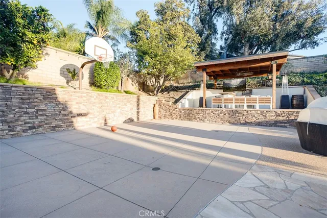 a swimming pool with outdoor seating