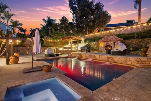 a view of a swimming pool with a lounge chairs