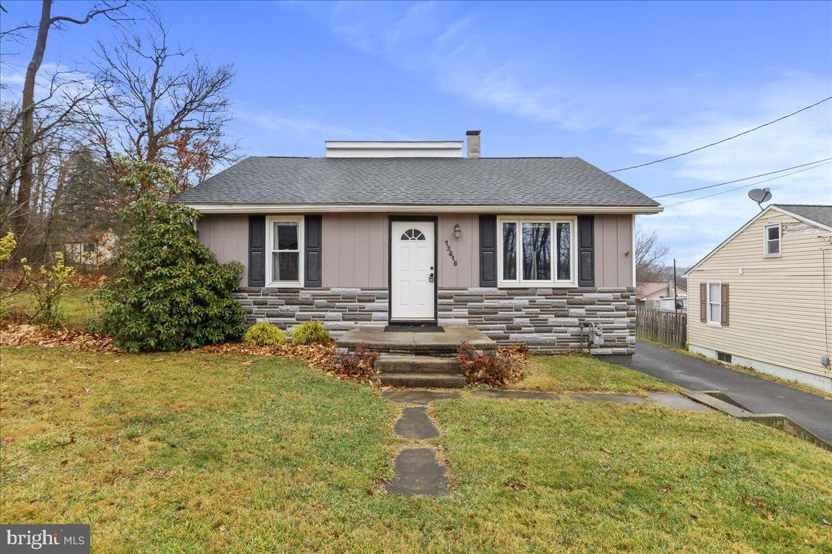 13815 Brant Road Southwest Cresaptown, MD 21502 - Photo 2 of 40 a front view of a house with yard