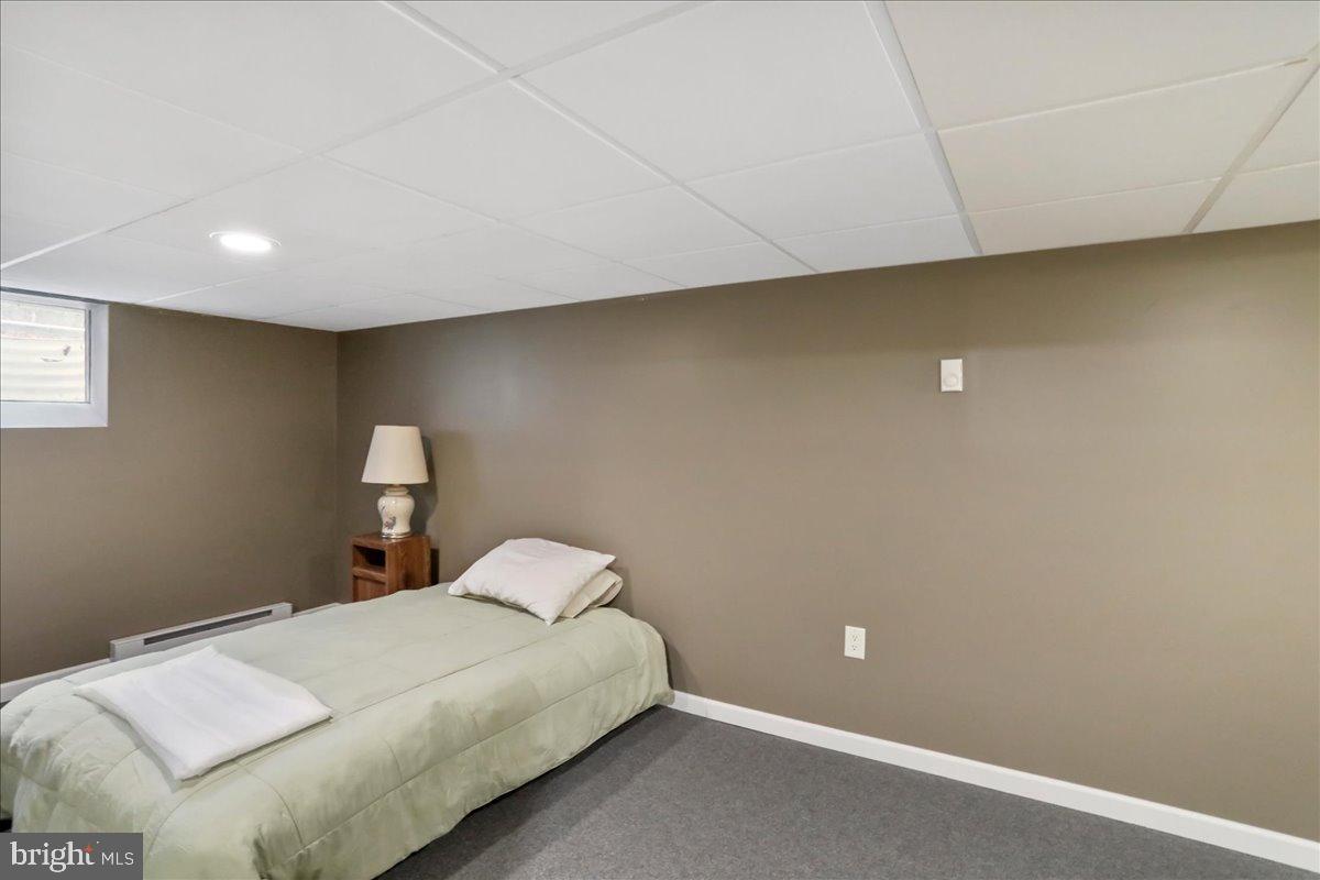13815 Brant Road Southwest Cresaptown, MD 21502 - Photo 26 of 40 a bed room with a bed and a night stand