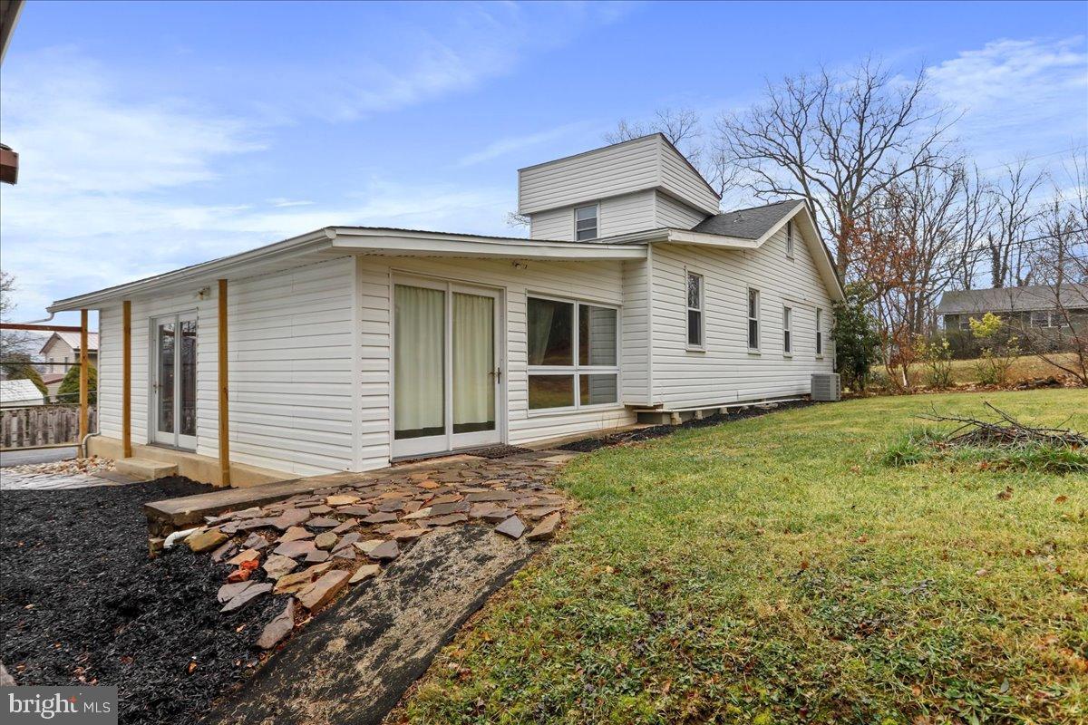 13815 Brant Road Southwest Cresaptown, MD 21502 - Photo 38 of 40 a front view of a house with a garden