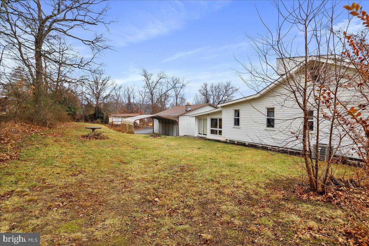 13815 Brant Road Southwest Cresaptown, MD 21502 - Photo 39 of 40 a view of a house with a yard