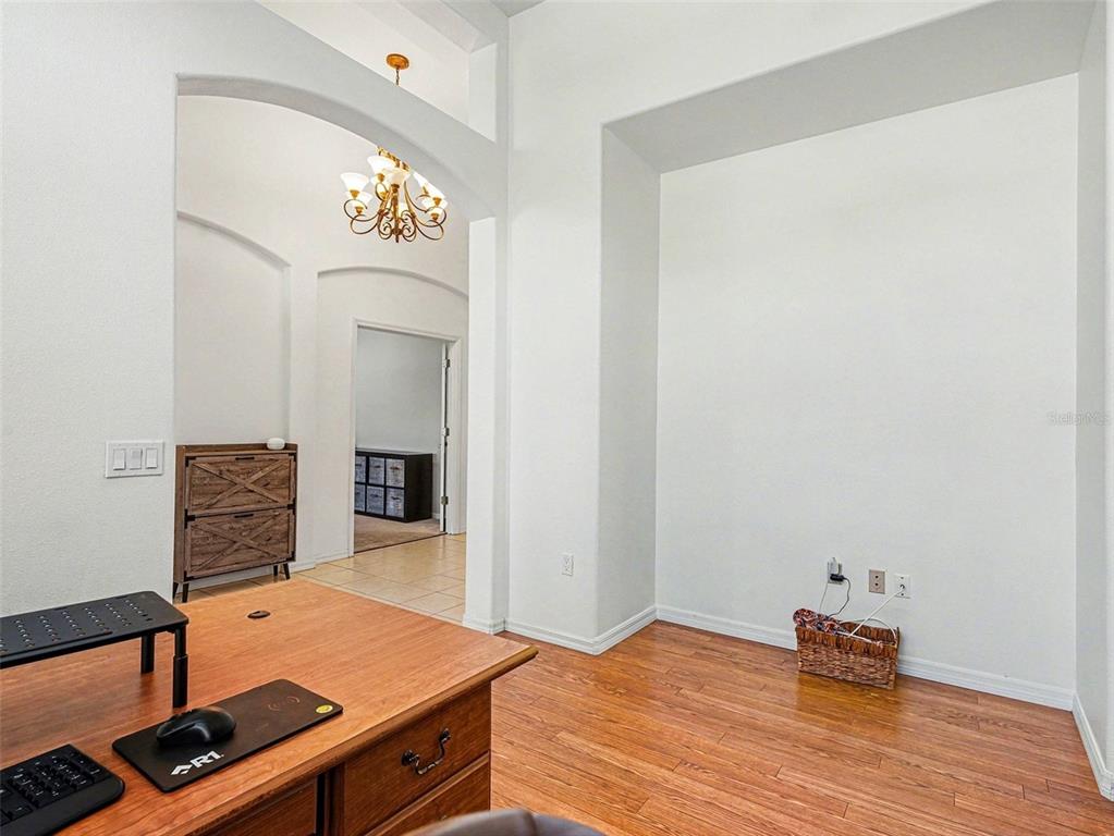 8443 Sailing Loop Lakewood Ranch, FL 34202 - Photo 19 of 34 a room with chair and table