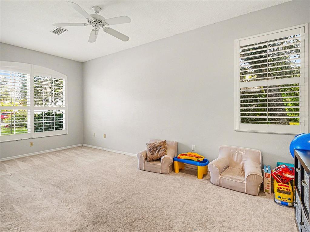 8443 Sailing Loop Lakewood Ranch, FL 34202 - Photo 29 of 34 a view of a livingroom with a window