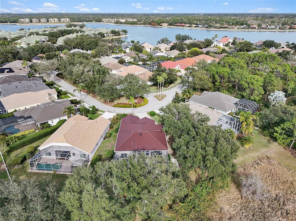 8443 Sailing Loop Lakewood Ranch, FL 34202 - Photo 34 of 34 an aerial view of a city with lots of residential buildings ocean and mountain view