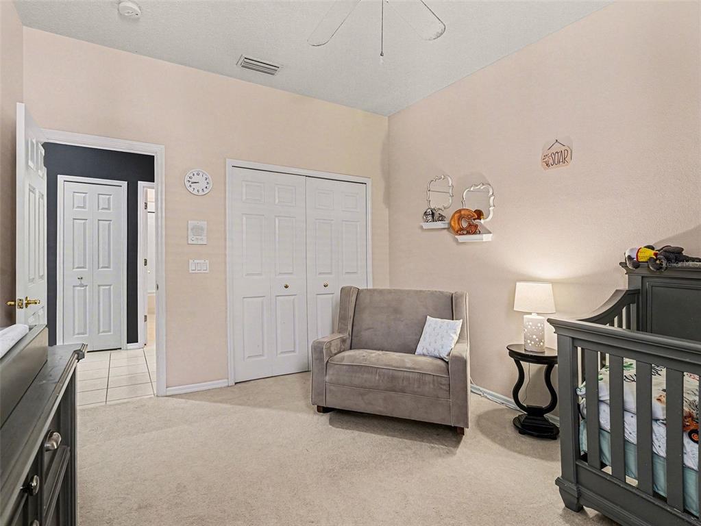 8443 Sailing Loop Lakewood Ranch, FL 34202 - Photo 9 of 34 a living room with furniture and a window