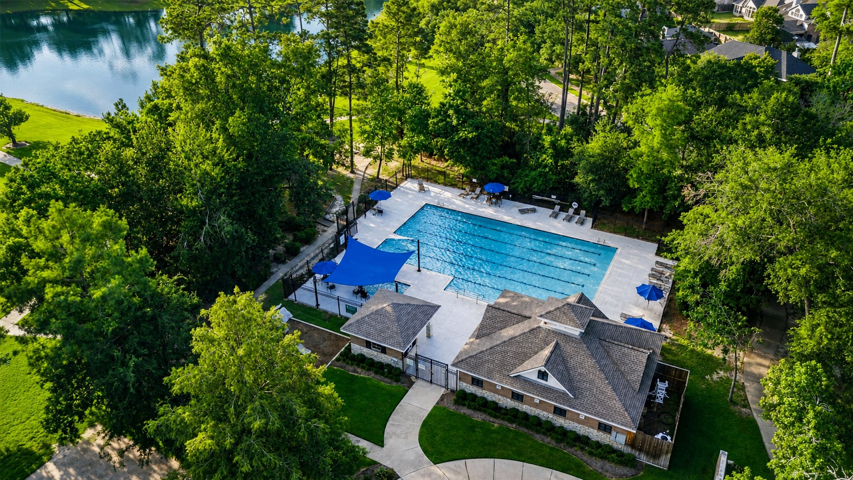 25926 Morgan Springs Spring, TX 77373 - Photo 45 of 49 The resort-style community pool provides the perfect place to cool off, relax, or gather with family and neighbors while enjoying the beautiful tree-lined surroundings and outstanding neighborhood amenities.