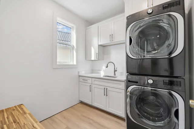 an empty room with windows and entrance