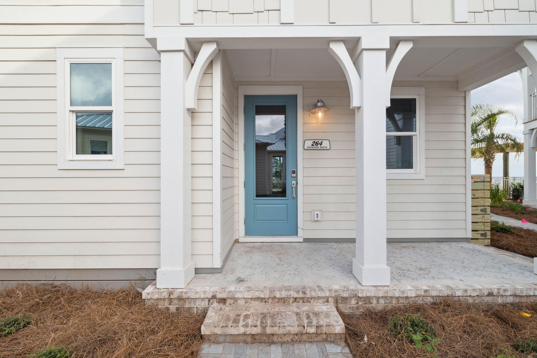 264 Dockside Drive Port St. Joe, FL 32456 - Photo 2 of 65 a front view of a house with a yard