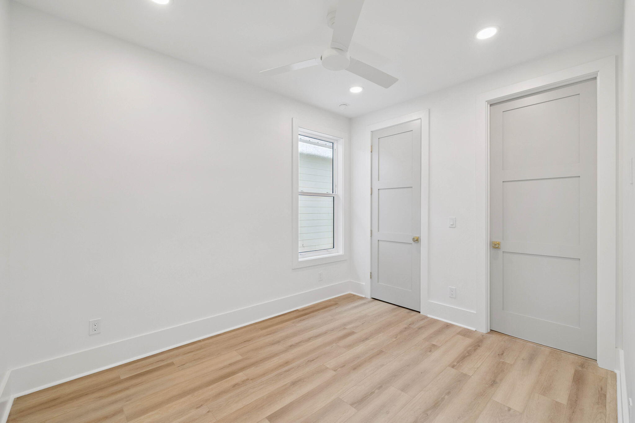 264 Dockside Drive Port St. Joe, FL 32456 - Photo 31 of 65 a view of empty room with wooden floor and fan